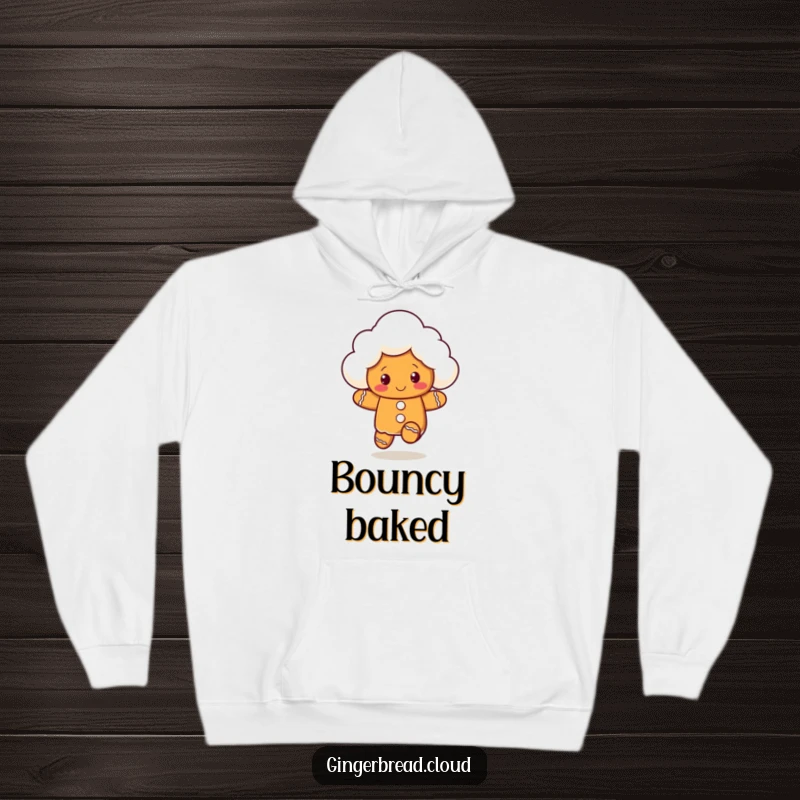 Funny hoodie showing a gingerbread cloud character playfully bouncing, offering warmth and a dose of lighthearted fun.