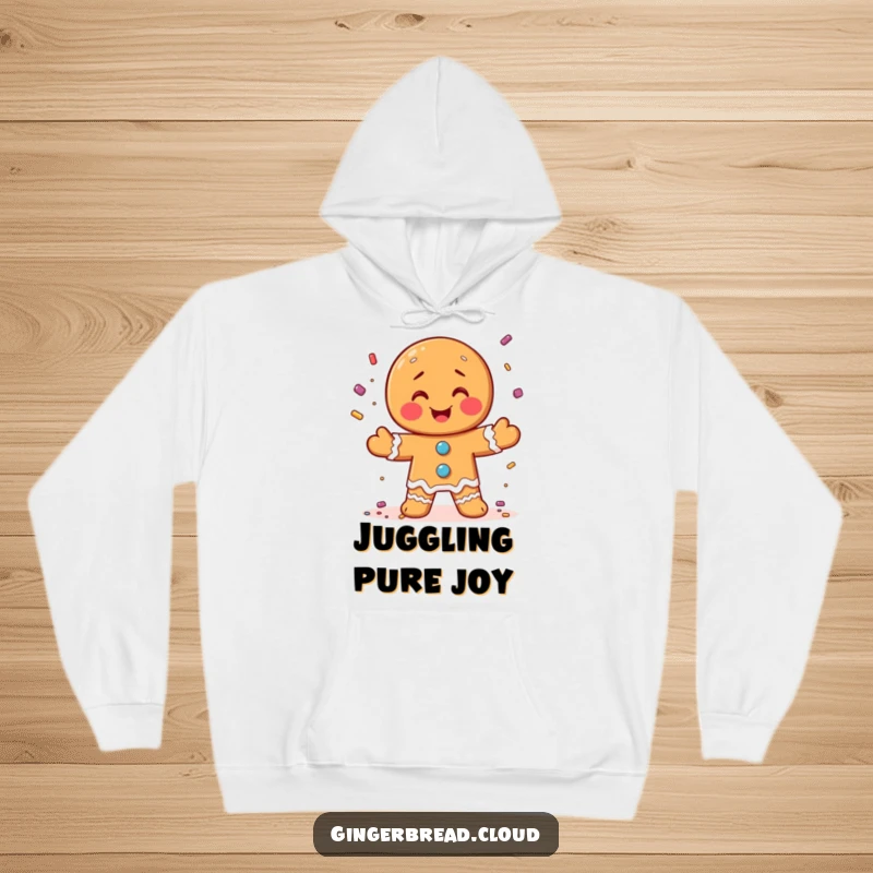 Funny hoodie with a gingerbread man masterfully juggling colorful candy sprinkles, full of festive energy.